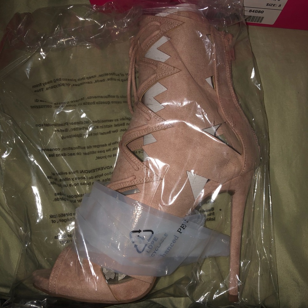 Light pink suede open toe heels